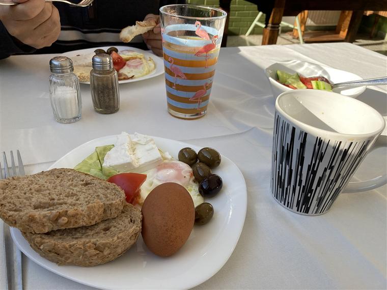 Breakfast with fresh bread, eggs and coffee